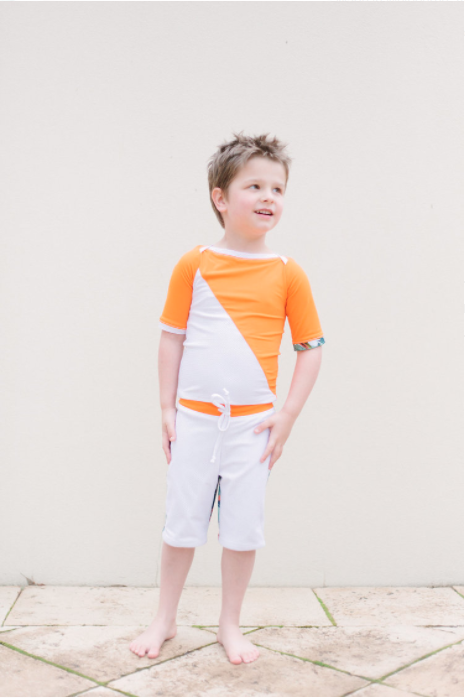 Elle Evans - Wilderkind Short Sleeve Rashie in Papaya Orange